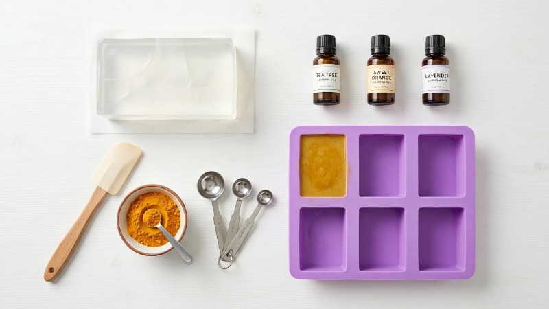 Overhead flat lay of soap-making ingredients Overhead flat lay of soap-making ingredients